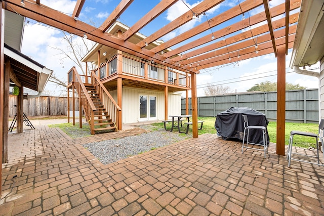 view of patio featuring area for grilling and a pergola