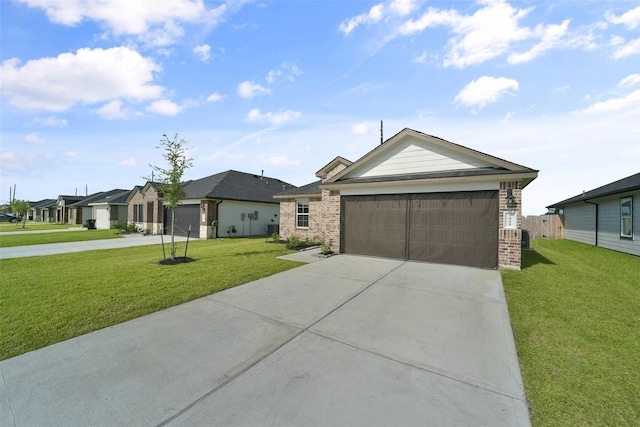 ranch-style house with a garage and a front yard