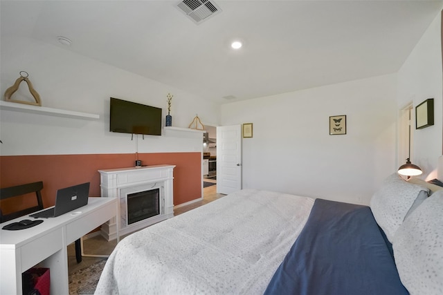 bedroom with light hardwood / wood-style flooring