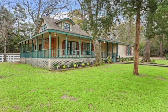 view of front of home with a porch and a front lawn