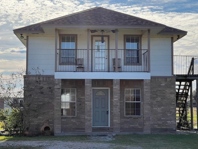 view of front of house with a balcony