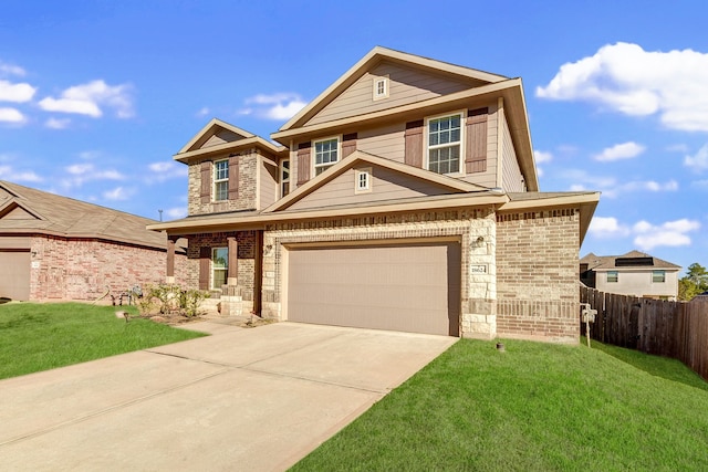 view of front of property with a garage and a front yard