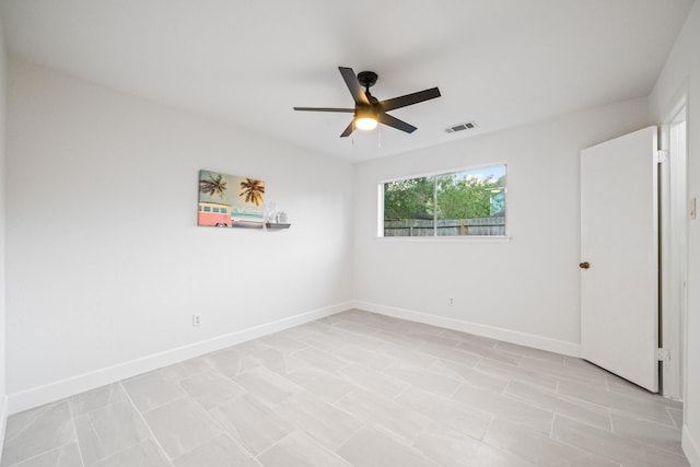 spare room featuring ceiling fan