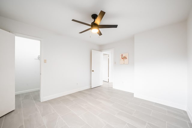 spare room featuring ceiling fan