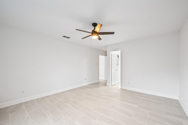 unfurnished room with ceiling fan