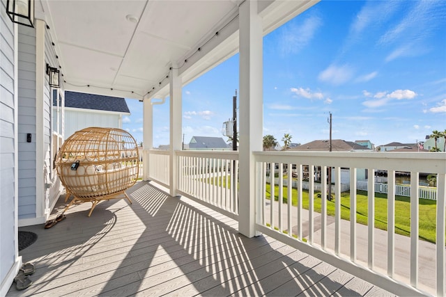 deck featuring a lawn