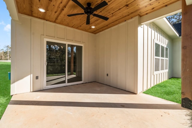 doorway to property featuring ceiling fan and a patio area