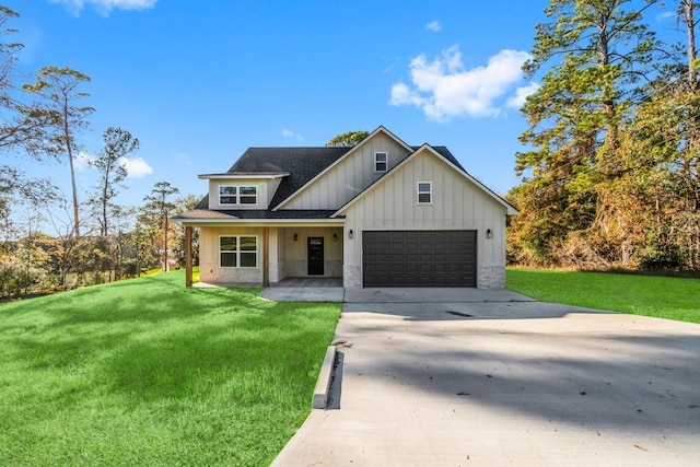 modern farmhouse with a garage and a front lawn