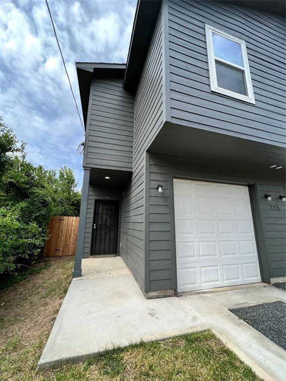 exterior space with a garage