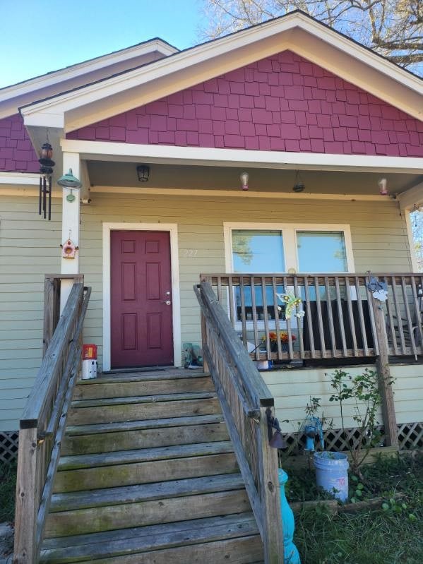 property entrance with a porch