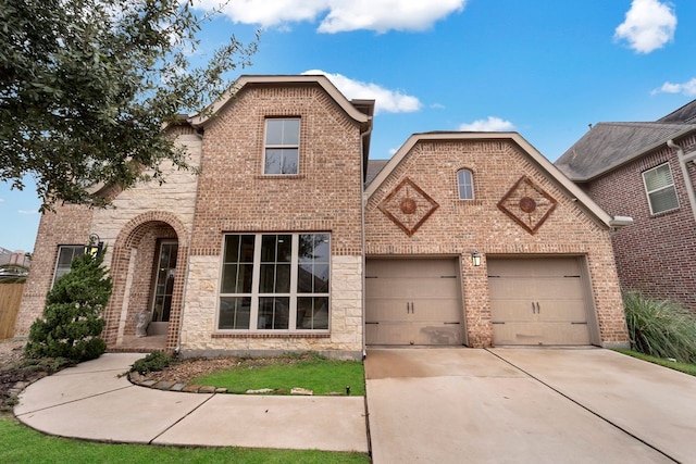 view of front of property featuring a garage