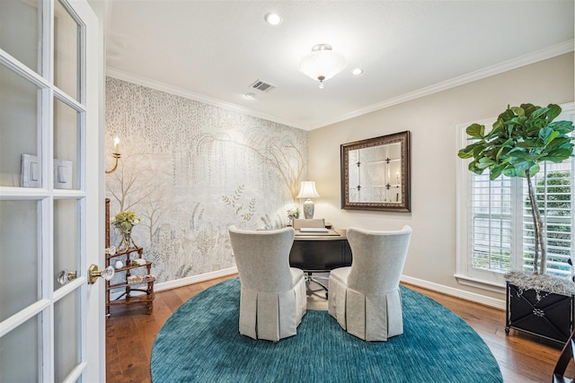 dining space with hardwood / wood-style flooring and ornamental molding