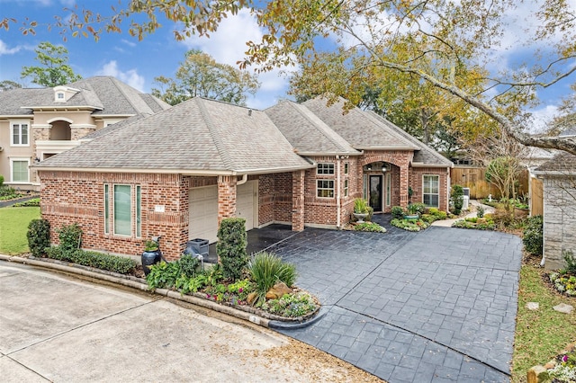 view of front of property with a garage