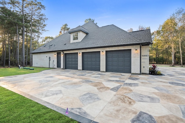 view of property exterior with a garage