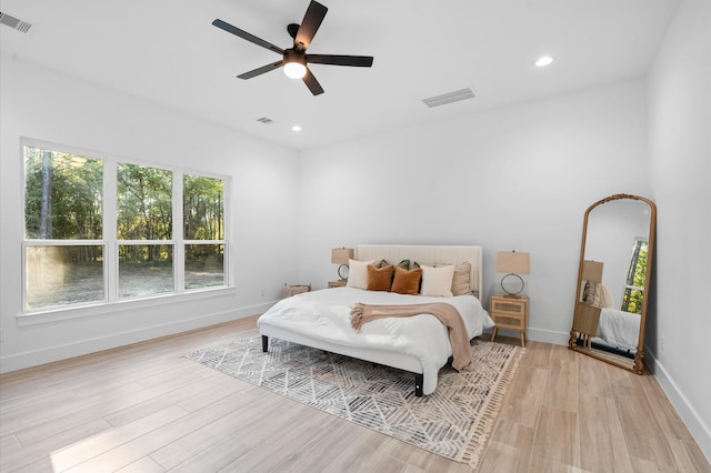 bedroom featuring ceiling fan and light wood-type flooring