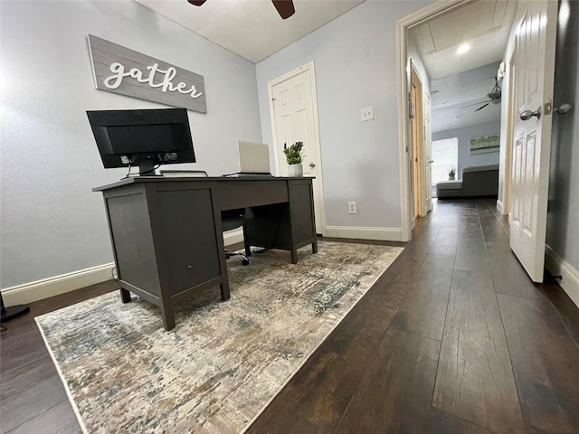 office with dark wood-type flooring and ceiling fan