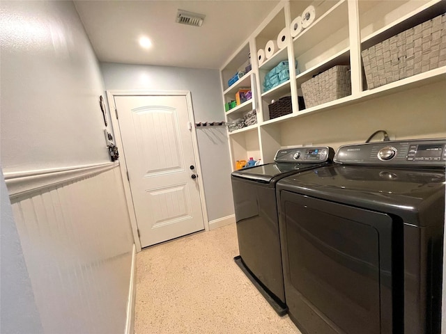 washroom featuring separate washer and dryer