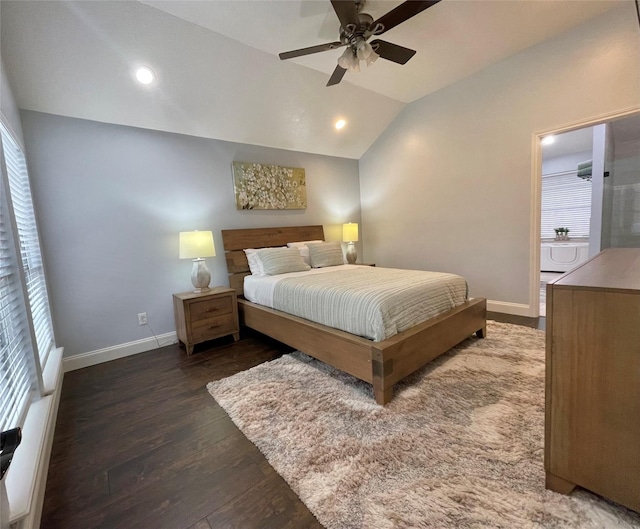 bedroom with lofted ceiling, dark hardwood / wood-style flooring, and ceiling fan