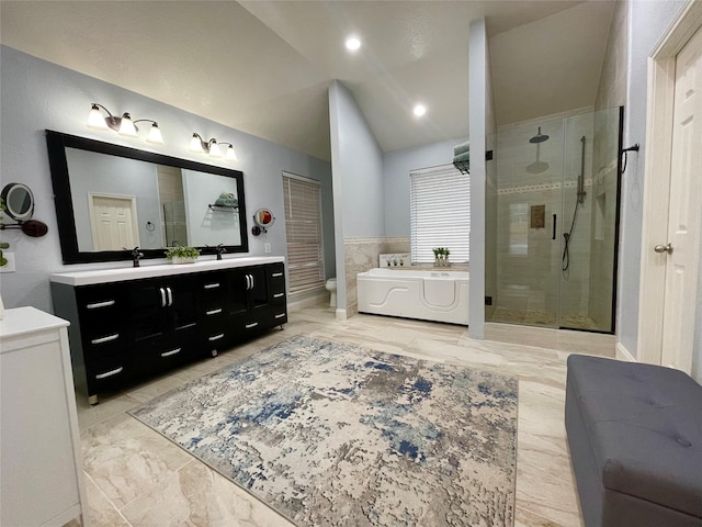 full bathroom with vanity, lofted ceiling, toilet, and separate shower and tub