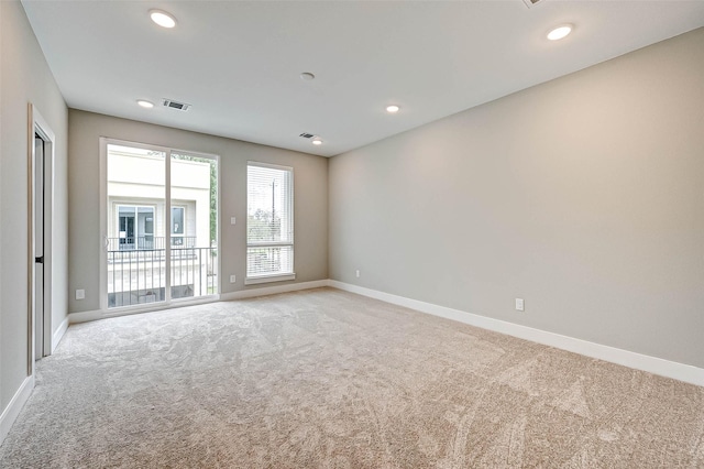 view of carpeted spare room