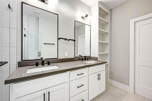 bathroom featuring walk in shower and vanity