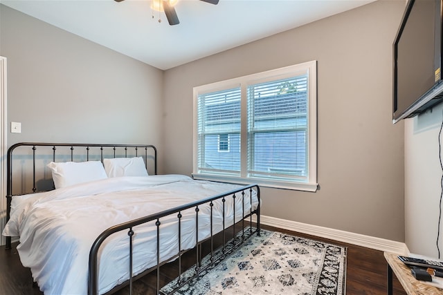 bedroom with hardwood / wood-style floors and ceiling fan