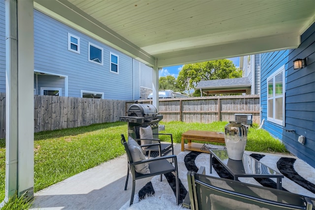 view of patio featuring central AC and grilling area