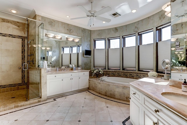 bathroom with ceiling fan, vanity, independent shower and bath, and tile patterned flooring