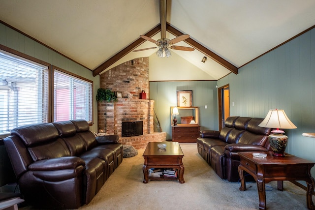 carpeted living room with a fireplace, lofted ceiling with beams, and ceiling fan