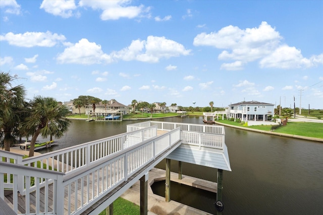 dock area with a water view