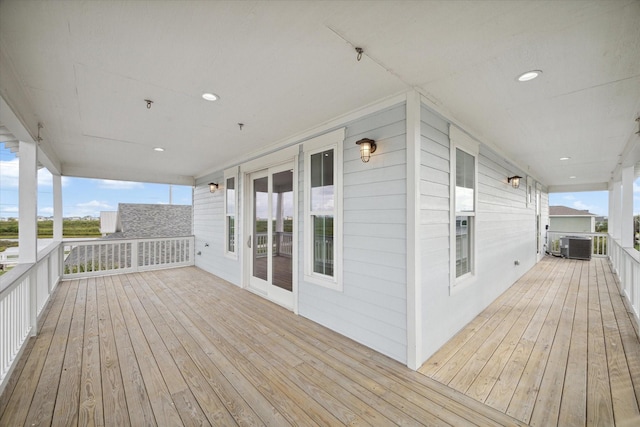 wooden terrace with central AC unit