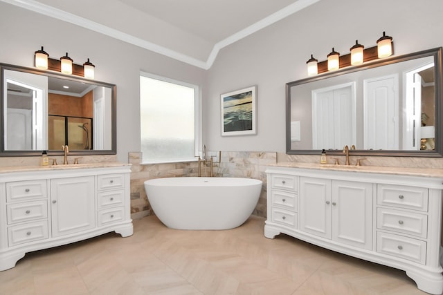 bathroom with ornamental molding, shower with separate bathtub, tile walls, and vanity