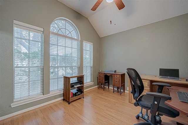 office space with vaulted ceiling, light hardwood / wood-style floors, and ceiling fan