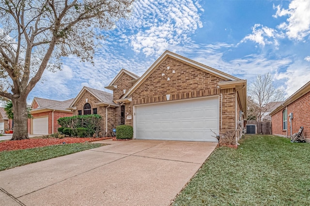 front of property featuring a front yard and central AC unit