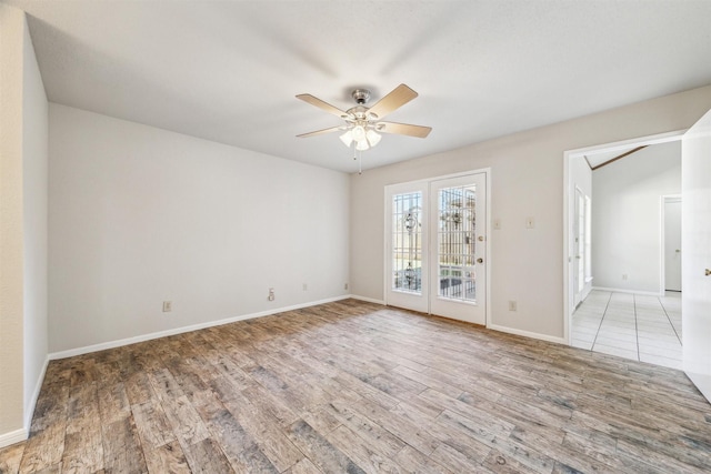 unfurnished room featuring hardwood / wood-style flooring and ceiling fan