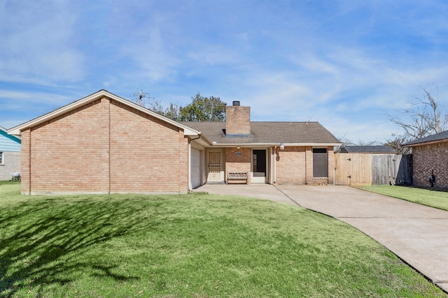 exterior space with a garage and a front yard