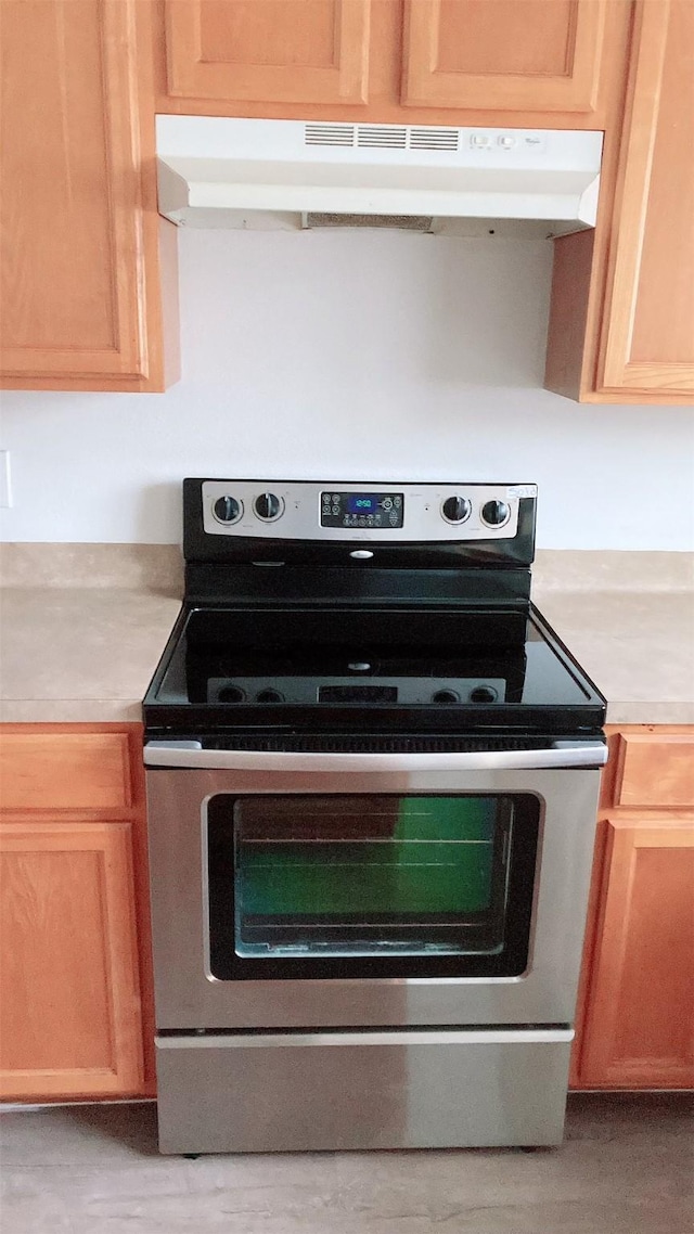 kitchen featuring electric range