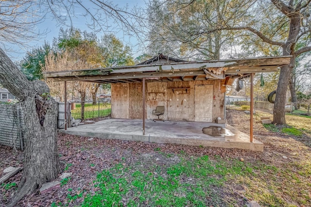 exterior space with an outbuilding