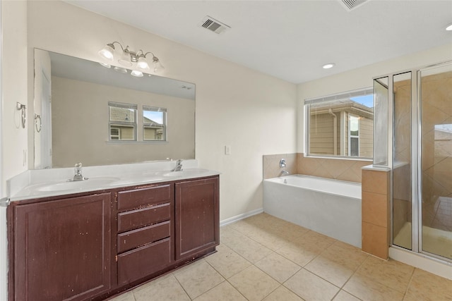 bathroom featuring plenty of natural light, plus walk in shower, and tile patterned flooring