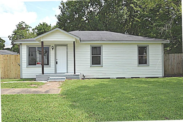 view of front of home with a front yard