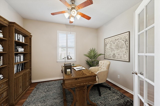 office space featuring dark wood-style floors, ceiling fan, baseboards, and french doors