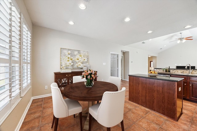 dining area featuring a ceiling fan, lofted ceiling, baseboards, and recessed lighting