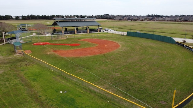 birds eye view of property with a rural view