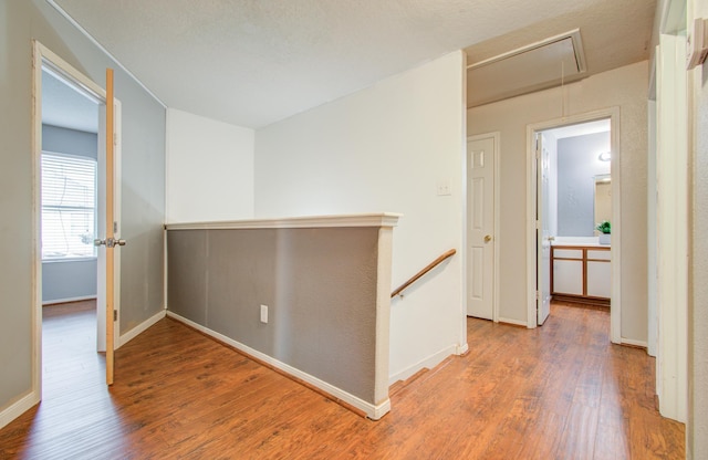 hallway featuring hardwood / wood-style floors