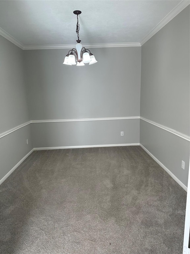 unfurnished room with baseboards, carpet, a chandelier, and crown molding