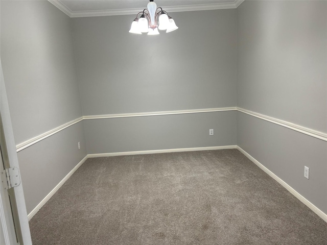 carpeted empty room featuring baseboards, a notable chandelier, and crown molding