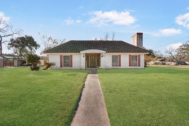 view of front facade featuring a front yard