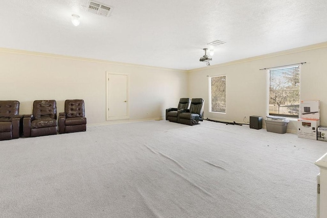 sitting room featuring ornamental molding and light carpet