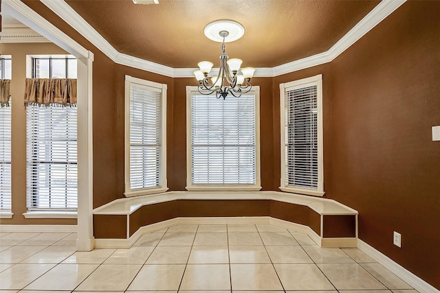 unfurnished dining area with a wealth of natural light, light tile patterned floors, and an inviting chandelier