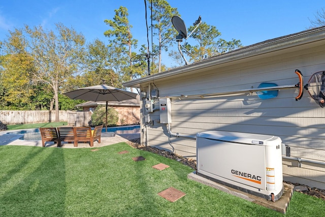 view of yard with fence and a fenced in pool